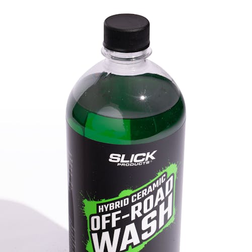 cap and pouring spout of slick products offroad wash