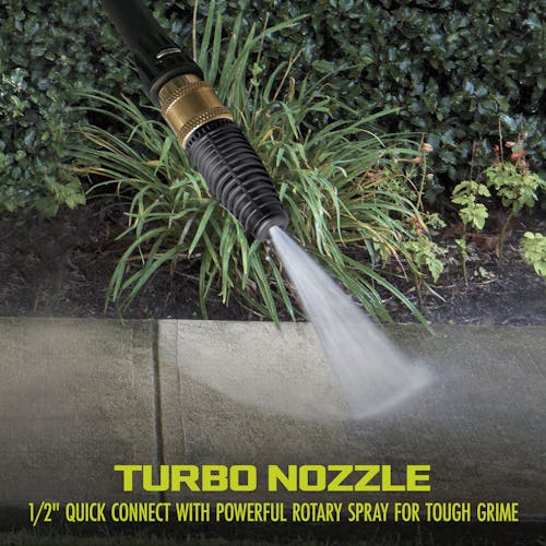 turbo nozzle blasting away grime on a sidewalk