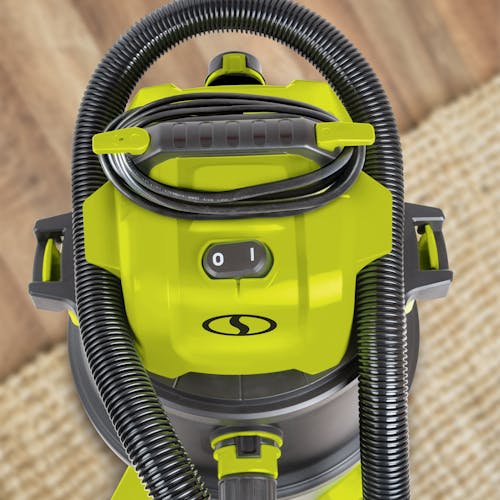 Close-up of the top of the Sun Joe 1200-watt 12-gallon HEPA Filtration Wet/Dry Shop Vacuum with the power cord wrapped around the handle.