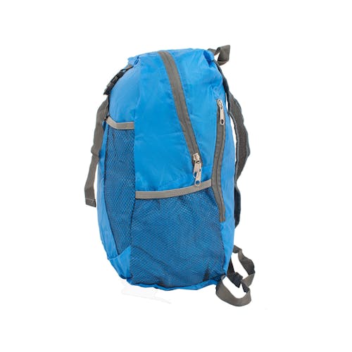 Left-side view of the TrailGear 19-liter waterproof blue backpack.