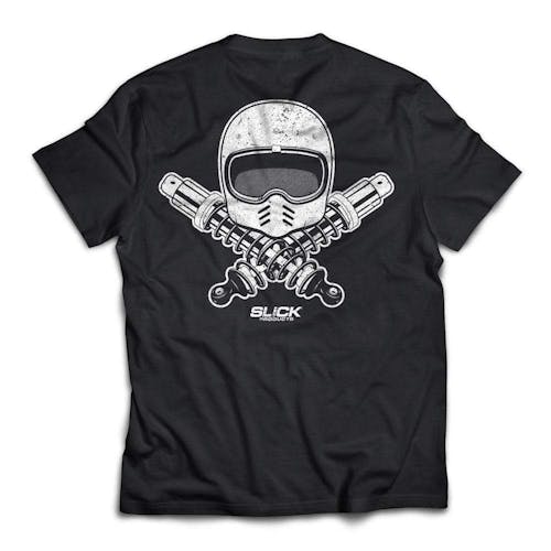 Slick Products Black Twin Tee. Twin shock absorbers and a vintage-style racing helmet is large on the back while the brand name is smaller under it.