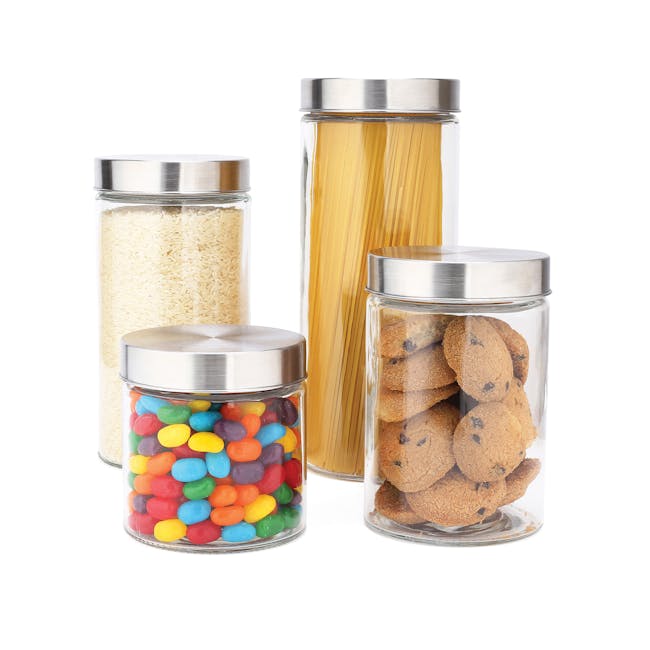 EatNeat Set of 4 Glass Kitchen Containers with stainless steel lids filled with different foods,