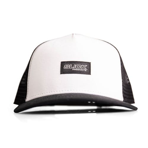 Front view of the Slick Products one-size-fits-all black and white micro snapback hat.