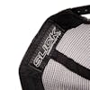 Close-up of the Slick Products tag inside the one-size-fits-all black and white micro snapback hat.