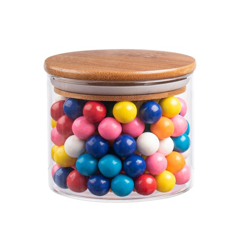 Small 27-ounce container filled with candy.