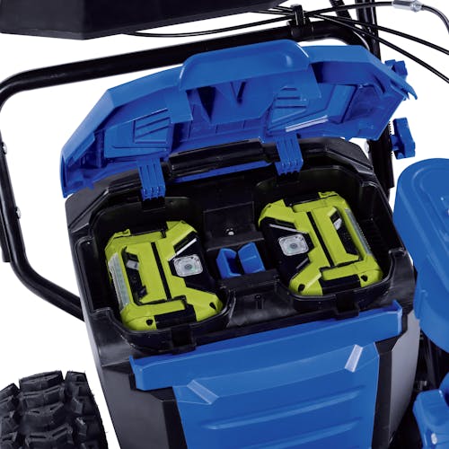 CLose-up of the battery compartment on the Snow Joe 100-volt 24-inch Cordless Dual-Stage Snow Blower with two batteries installed.