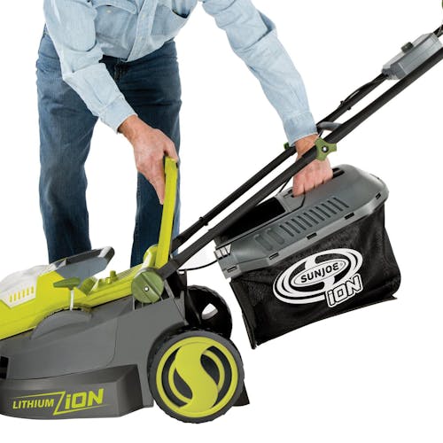 Person attaching the collection bag to the Sun Joe 40-volt 16-inch Cordless Brushless Lawn Mower Kit.